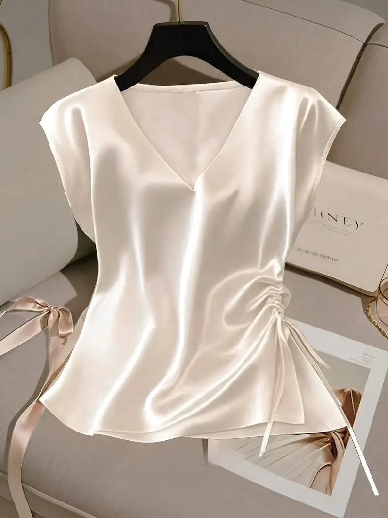Elegant White Satin V-Neck Blouse for Women - Sleeveless, Ruched Detail, Perfect for Spring/Summer, Stylish and Sophisticated Design, Summer Fashion Top | Ruched Detail Top | Smooth Texture